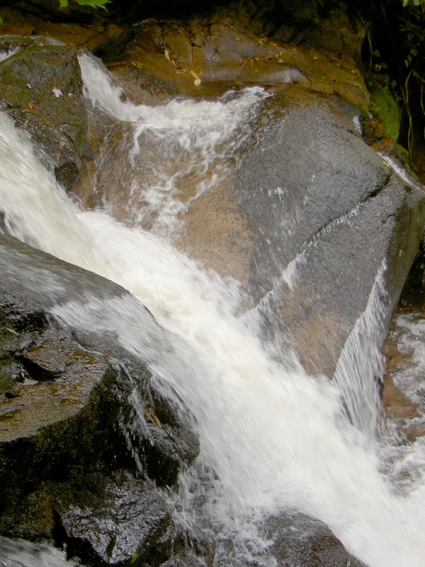 The thin sheet of water flowing across this rock was very cool.