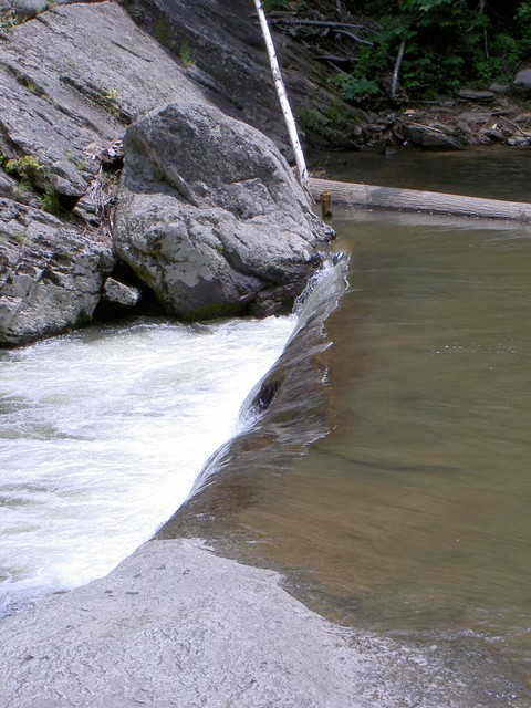 More water spilling out of the pool below the falls. Wonder how deep this pool is?