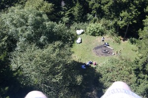 Looking down at the campsite from the firetower, while sitting on the edge...