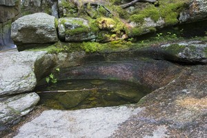 Big round pothole (with lots of mosquitos!)