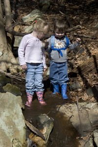 Bailey and Ben wading in the creek