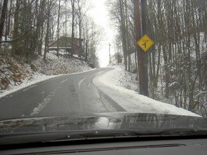 About an inch of snow on the road into Dennis Cove