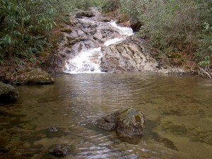 The first falls visible after the road ends at a turnaround and gate